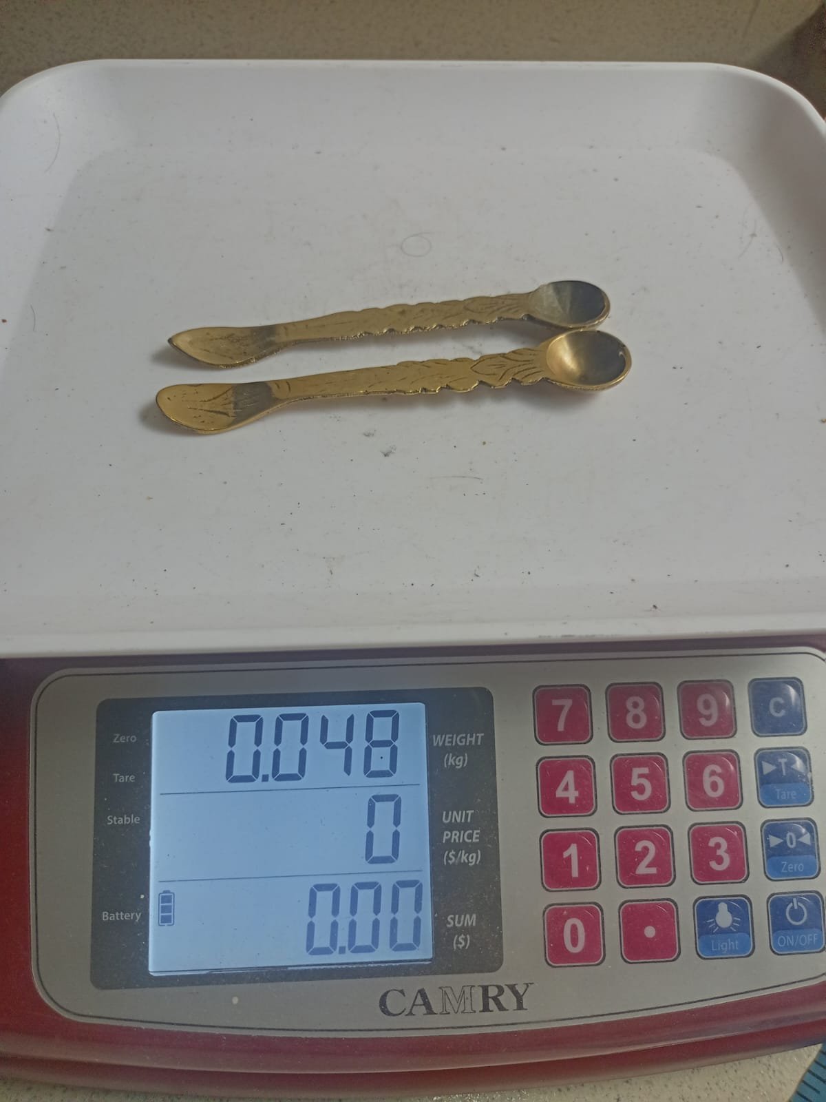 অলংকৃত পিতলের চামচ