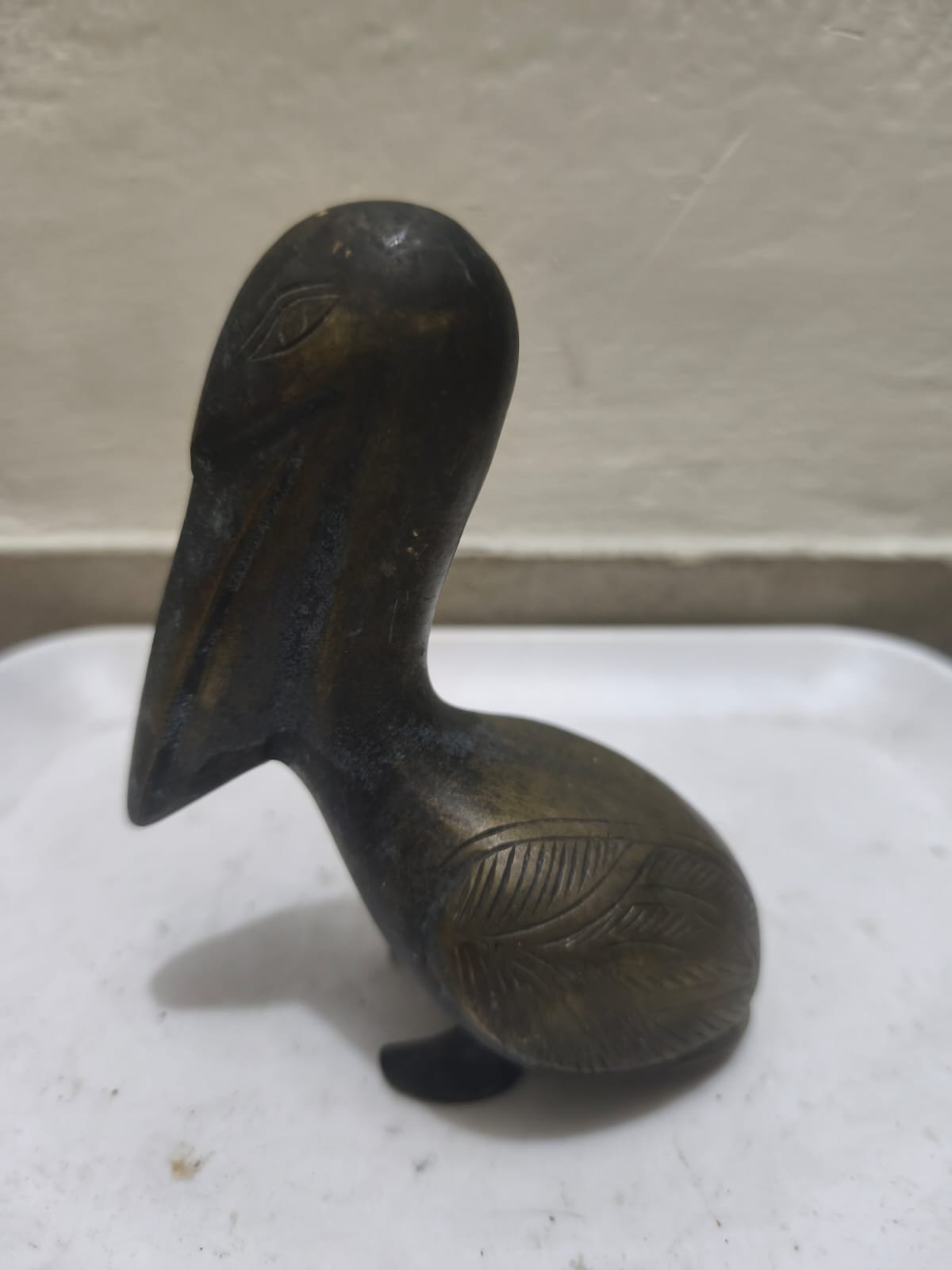 পিতলের পেলিকান মূর্তি/“পিতলের পাখি – শান্তির প্রতীক”